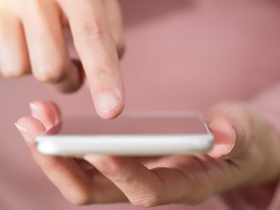young women shopping online on smartphone. business and modern l